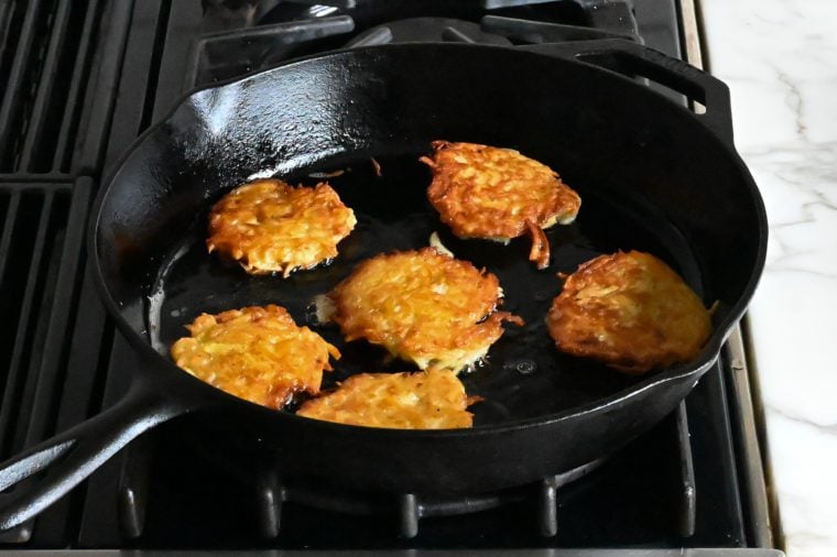 crispy latkes in skillet