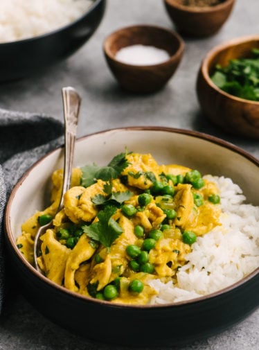 Chicken curry and rice in a bowl.
