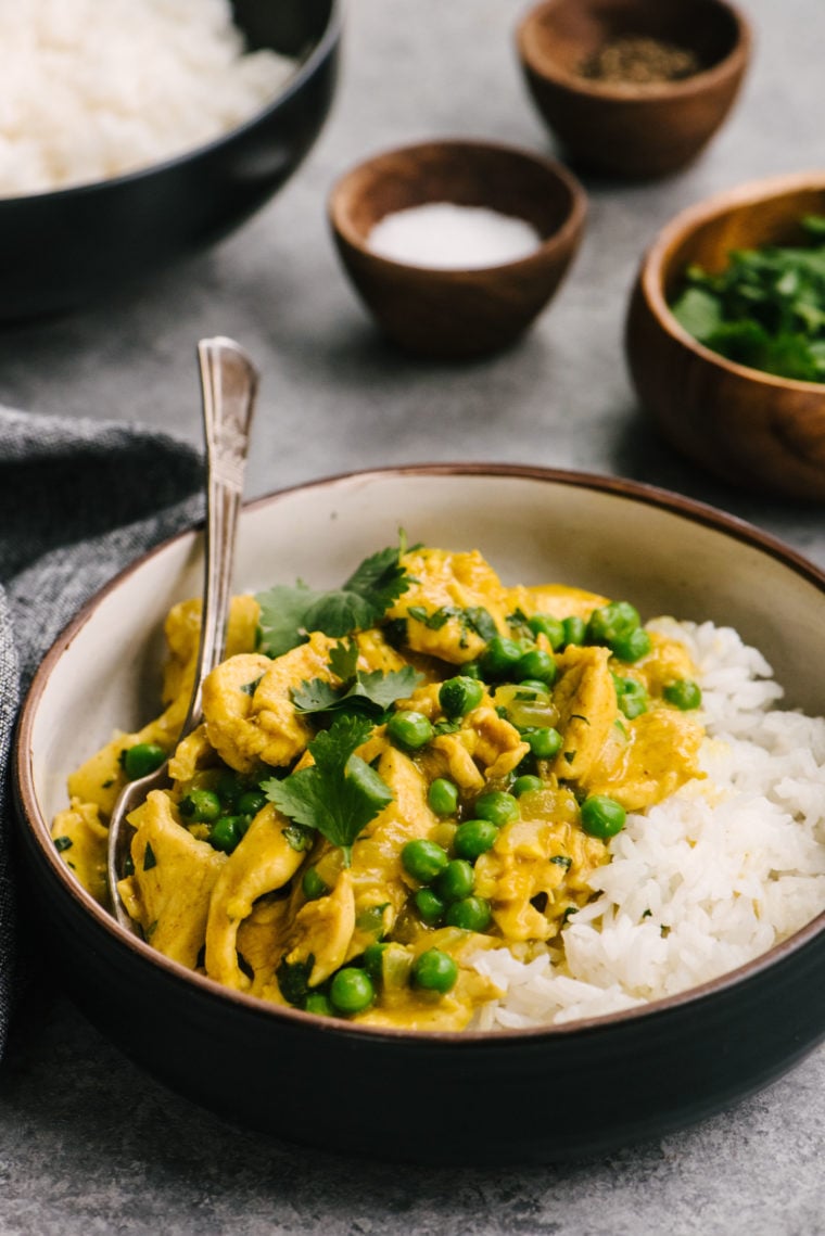 Chicken curry and rice in a bowl.