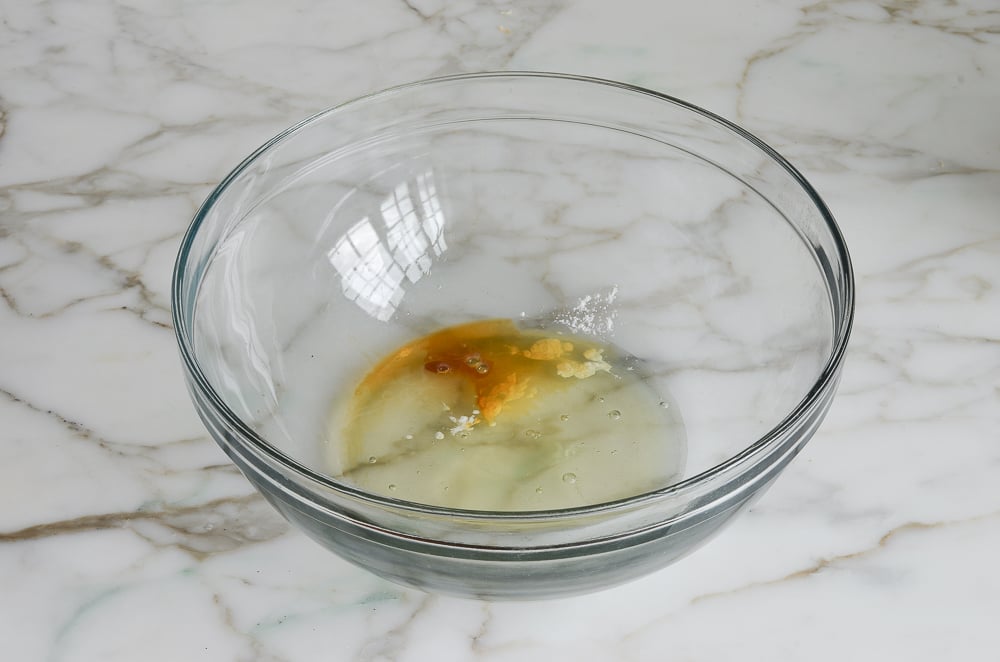 egg whites, cream of tartar and vanilla in a large mixing bowl