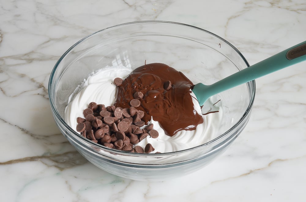 egg whites with melted chocolate and chocolate chips added