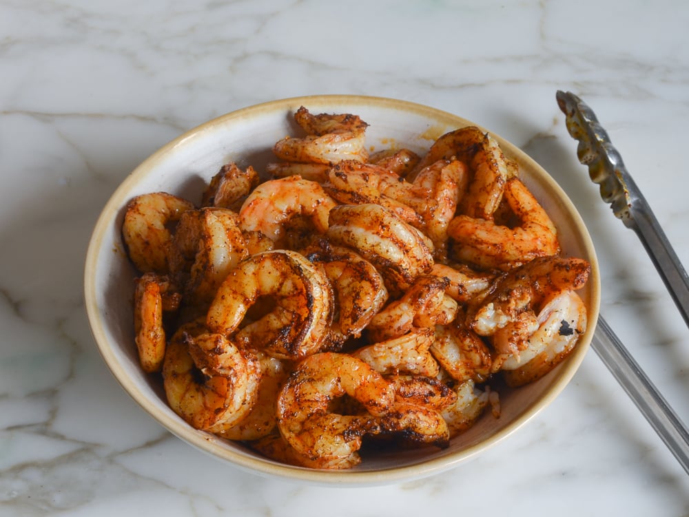 Bowl of grilled shrimp.