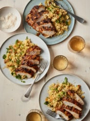 Plates of grilled Moroccan chicken.