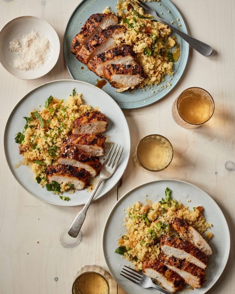 Plates of grilled Moroccan chicken.