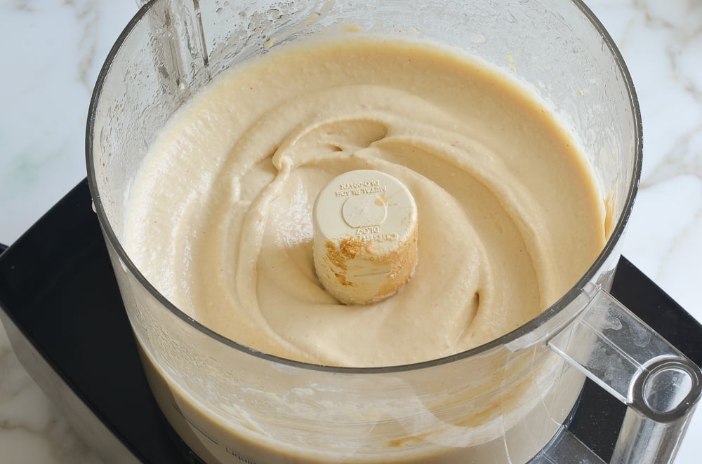 Blended hummus in food processor