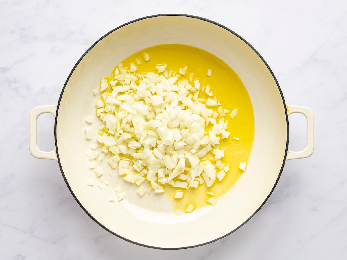 olive oil and diced onions in large dutch oven