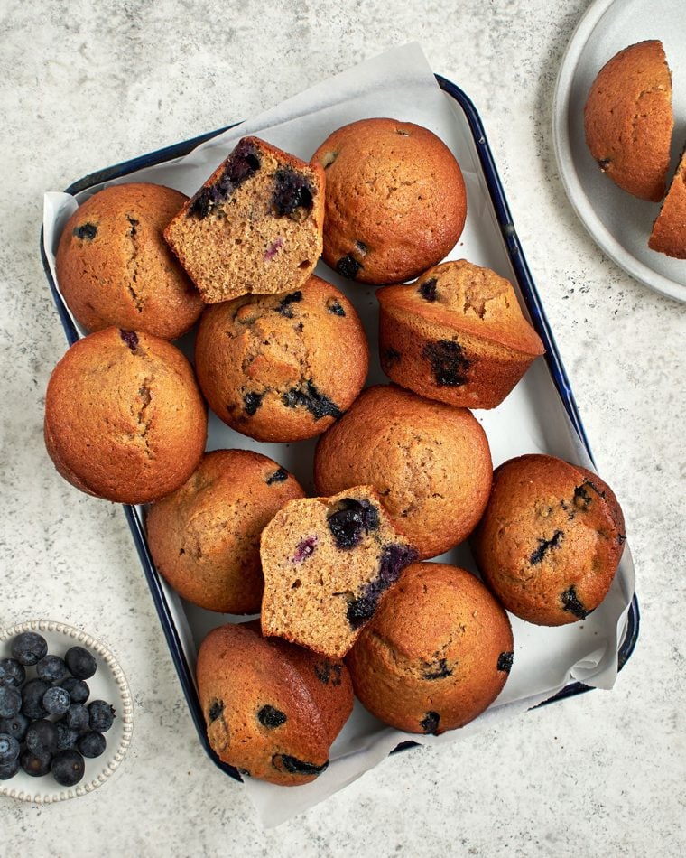 blueberry maple bran muffins on baking tray