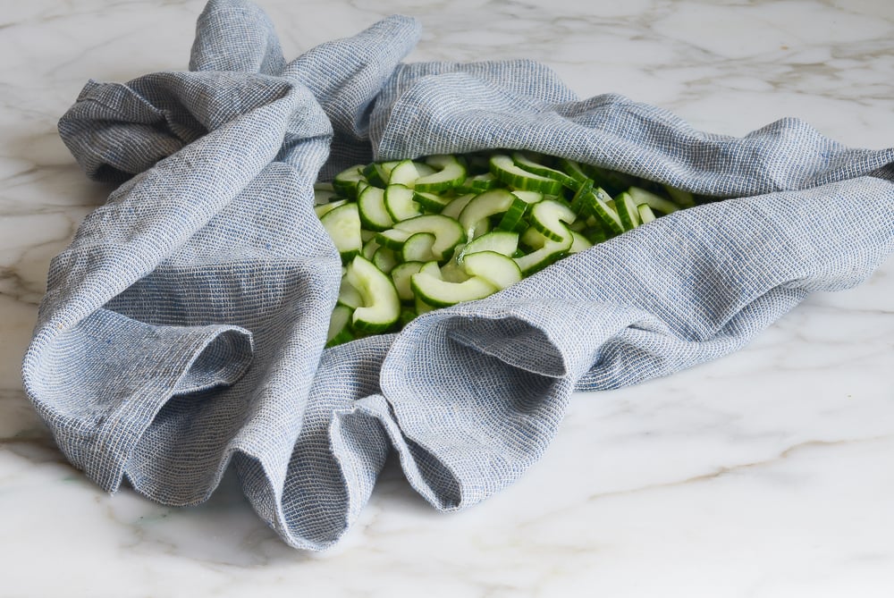 blotting the cucumbers dry