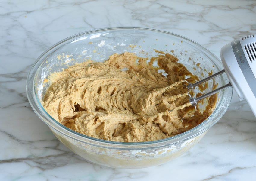 Bowl of pumpkin cookie dough.