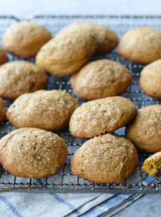 Spiced pumpkin cookies on a wire rack.