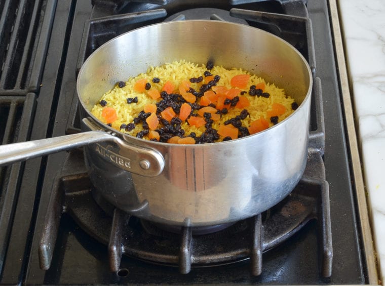 adding the dried fruit