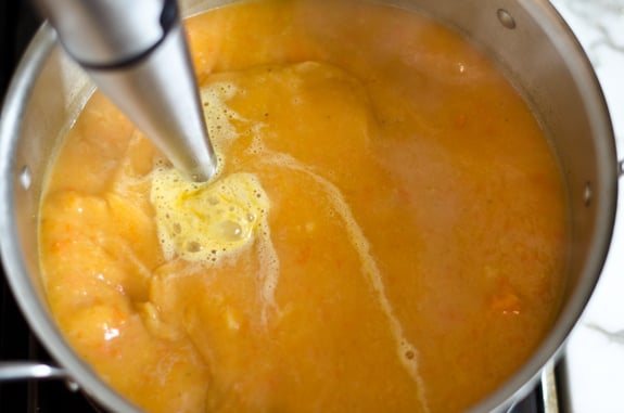 blending-soup Immersion blender in a pot of soup.
