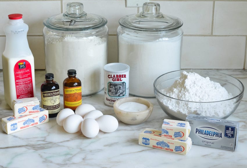 Cake ingredients including eggs, vanilla, and cream cheese.