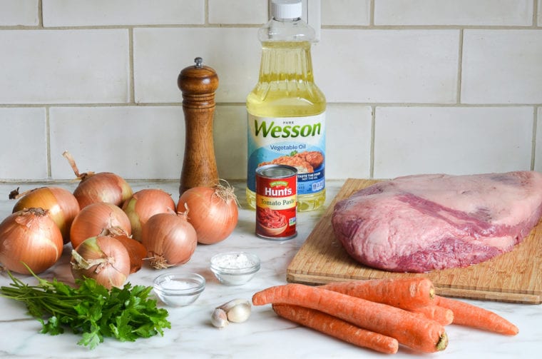 Brisket ingredients including carrots, tomato paste, and garlic.