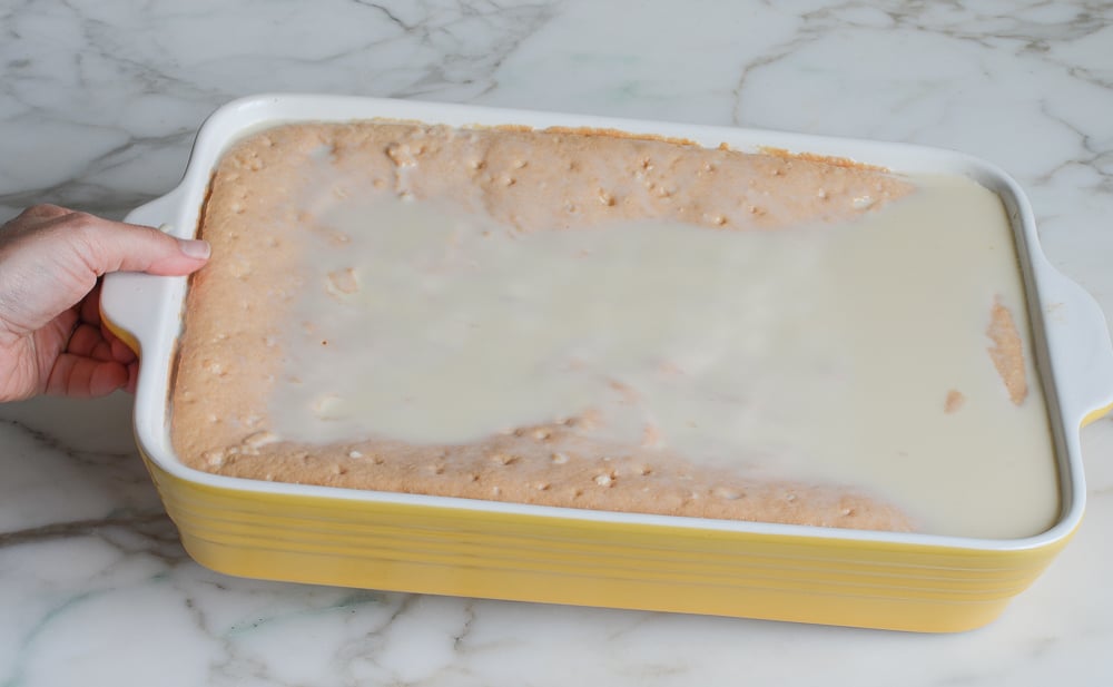 tilting baking dish to help liquid absorb