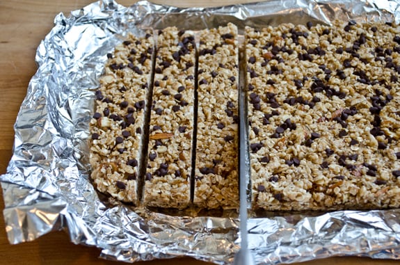 cutting-bars Partially-sliced granola bar mixture.