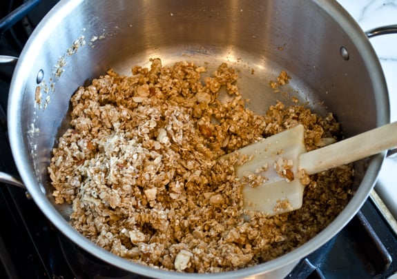 mixed Granola mixture in a pan.