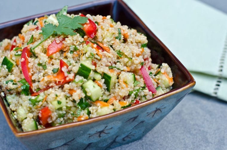 Thai quinoa salad in a square bowl.