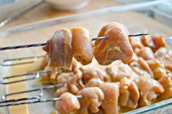 Marinated chicken on skewers.