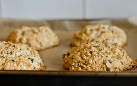 Scones on a lined baking sheet.