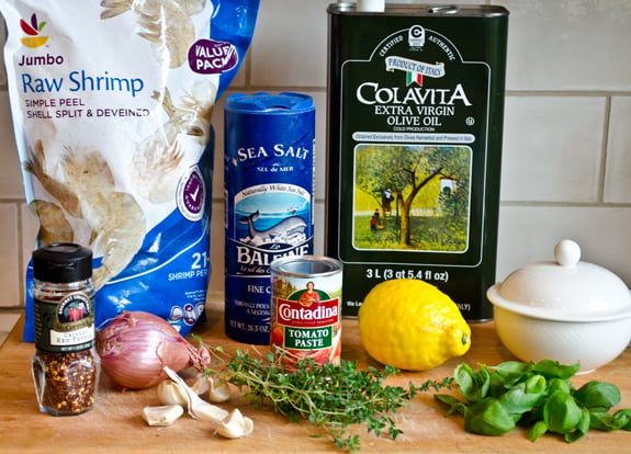 Shrimp ingredients including lemon, tomato paste, and garlic.