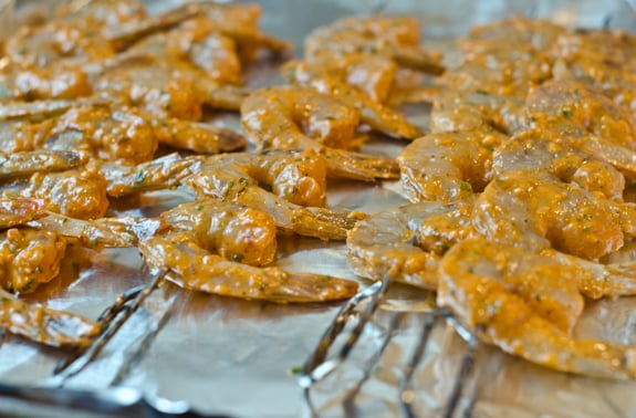 Marinated shrimp on skewers.