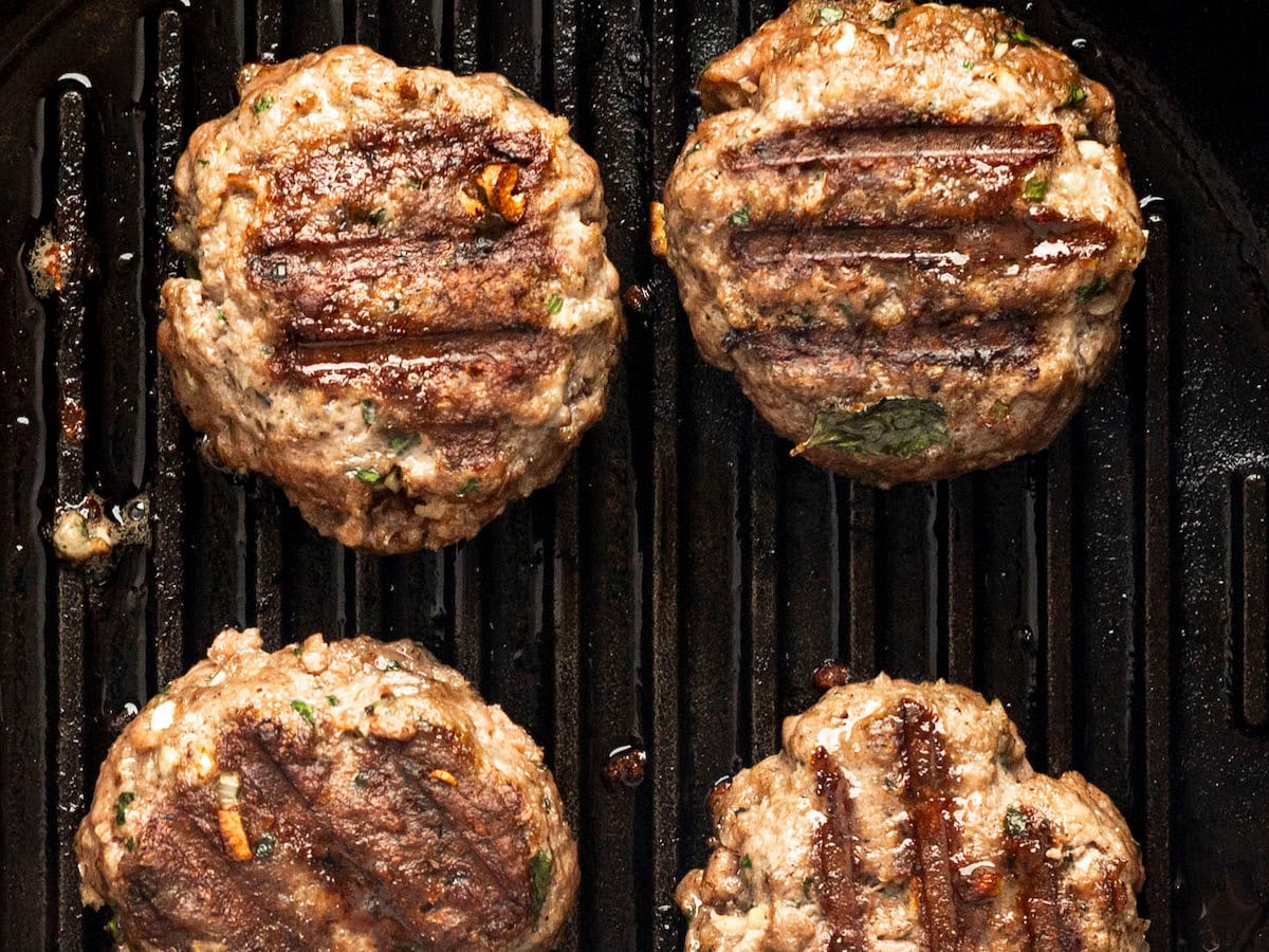 grilling the meatballs in a grill pan.