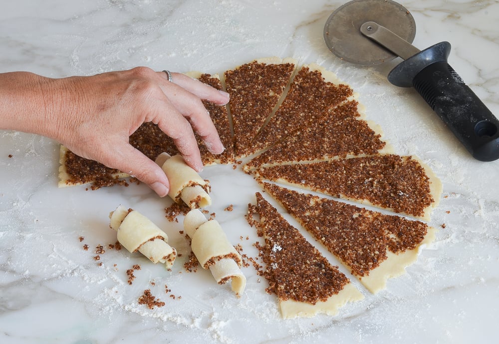 rolling up the rugelach wedges
