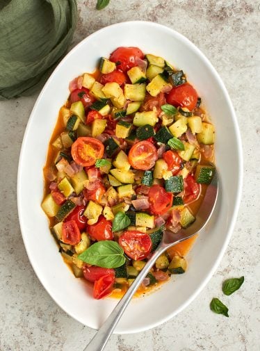 sautéed zucchini and tomatoes on platter