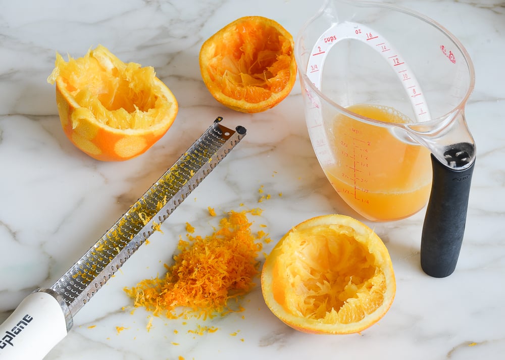 zesting and juicing the oranges
