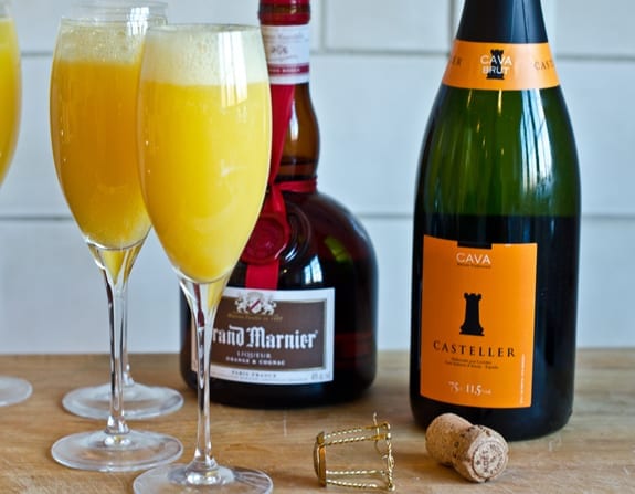 Grand mimosas in champagne glasses.
