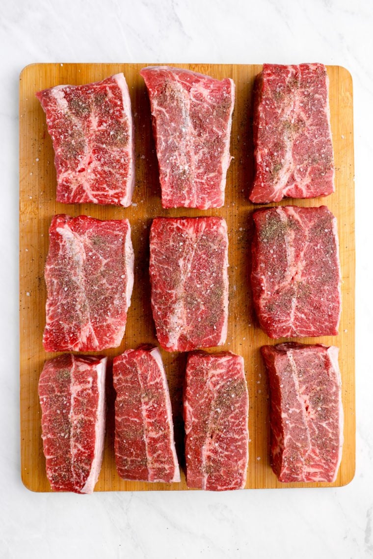 seasoned short ribs on cutting board