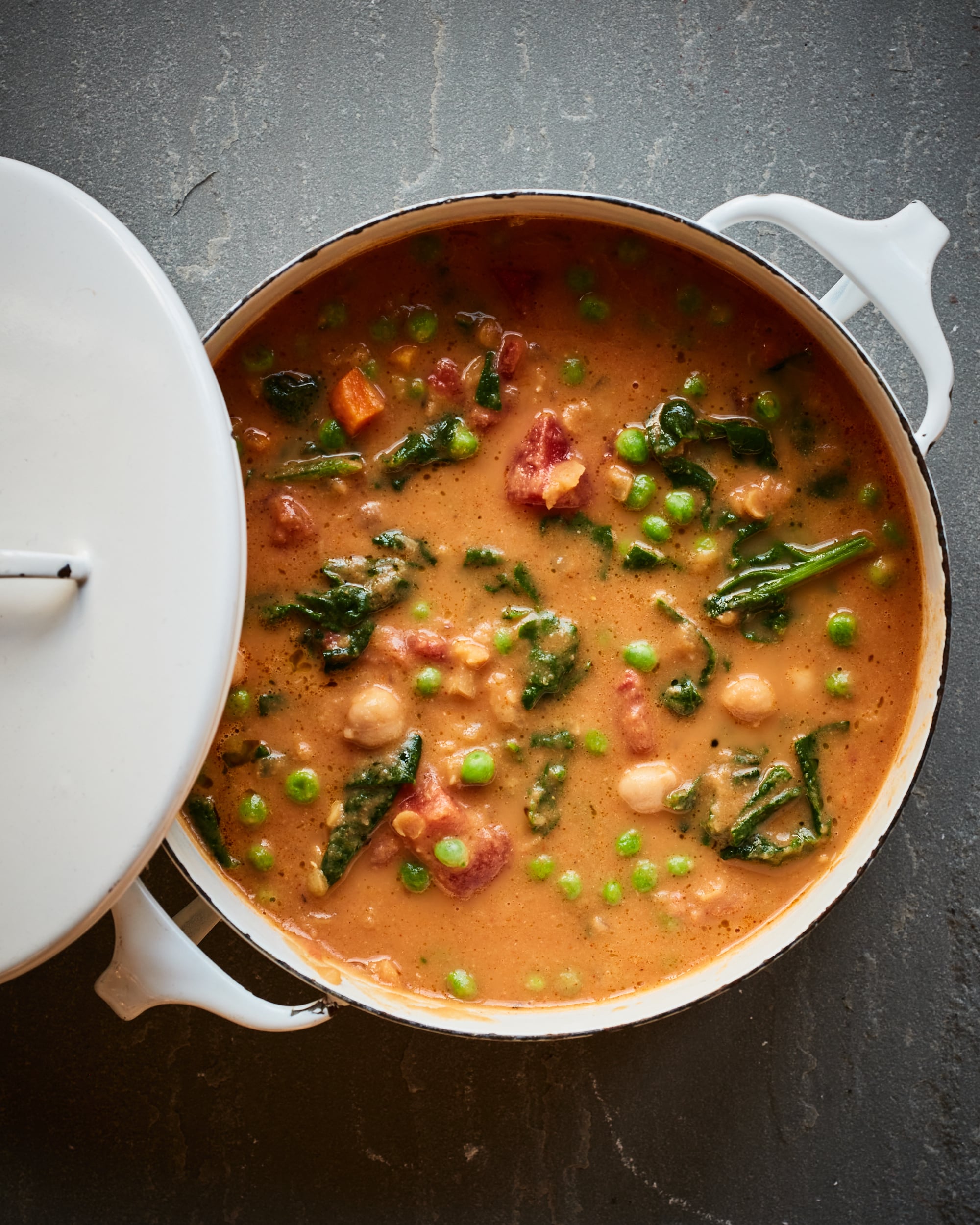 Pot of smoky chickpea, red lentil, and vegetable soup.