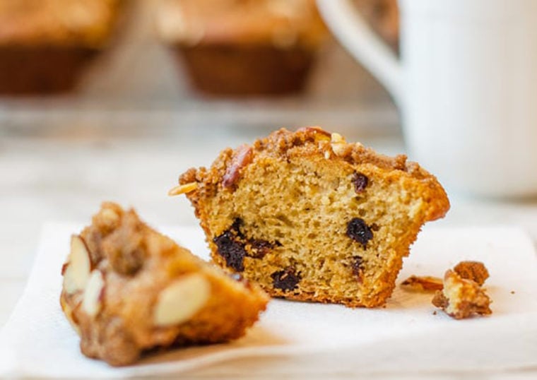 Dried cherry buttermilk muffin with almond streusel cut in half.
