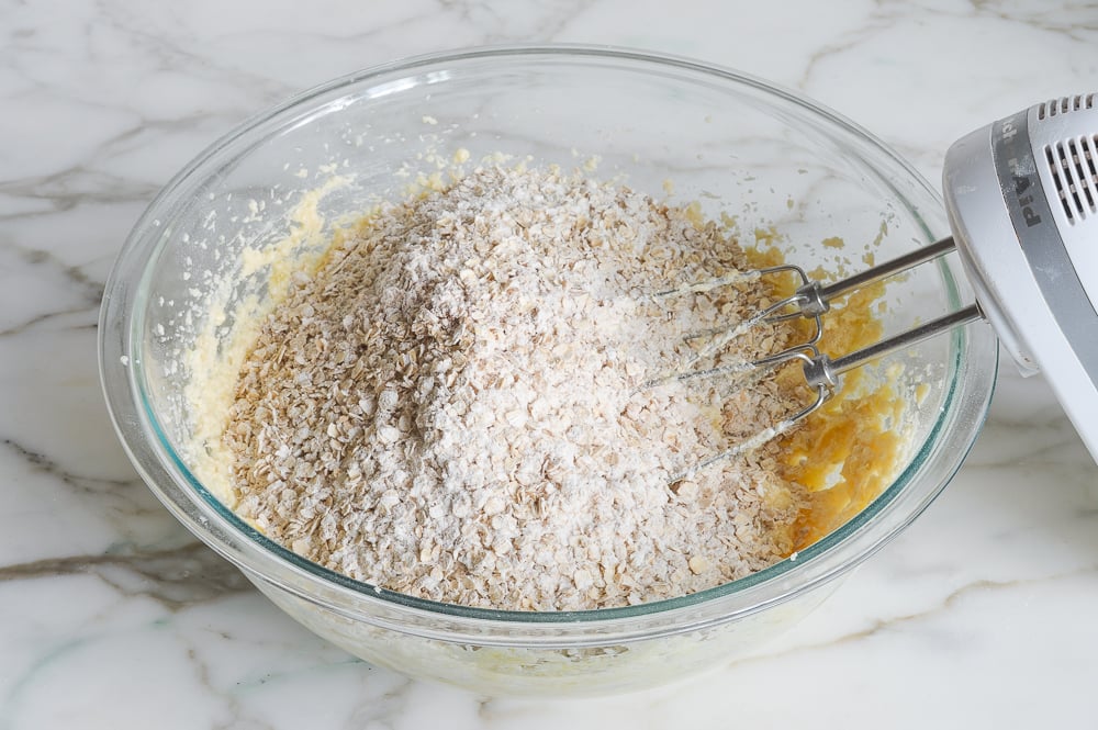 adding the dry ingredients to the batter