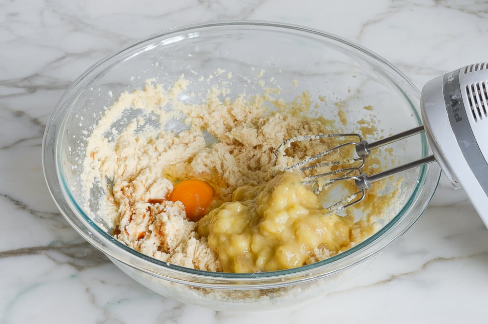adding the egg, vanilla, and banana