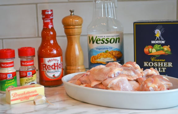 Wing ingredients including Frank's Red Hot, chili powder, and onion powder.