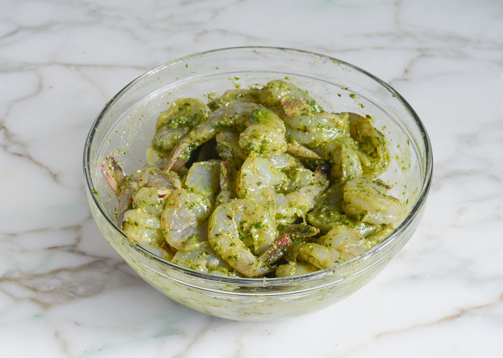 shrimp marinating in pesto