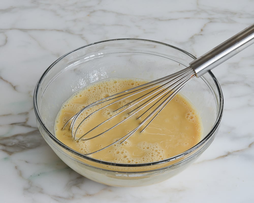 whisked liquid ingredients in mixing bowl