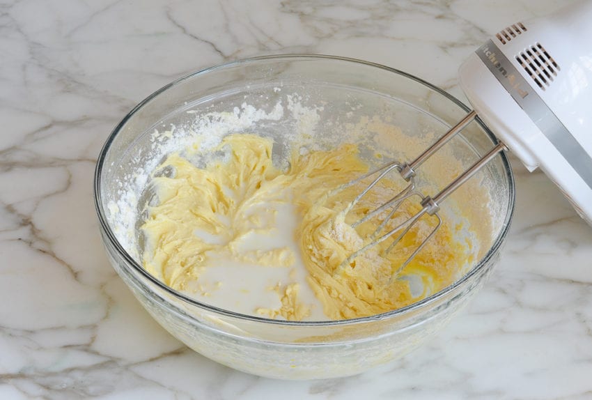 Milk in a bowl with a butter mixture.