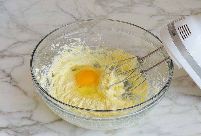 Egg in a bowl with a butter mixture.