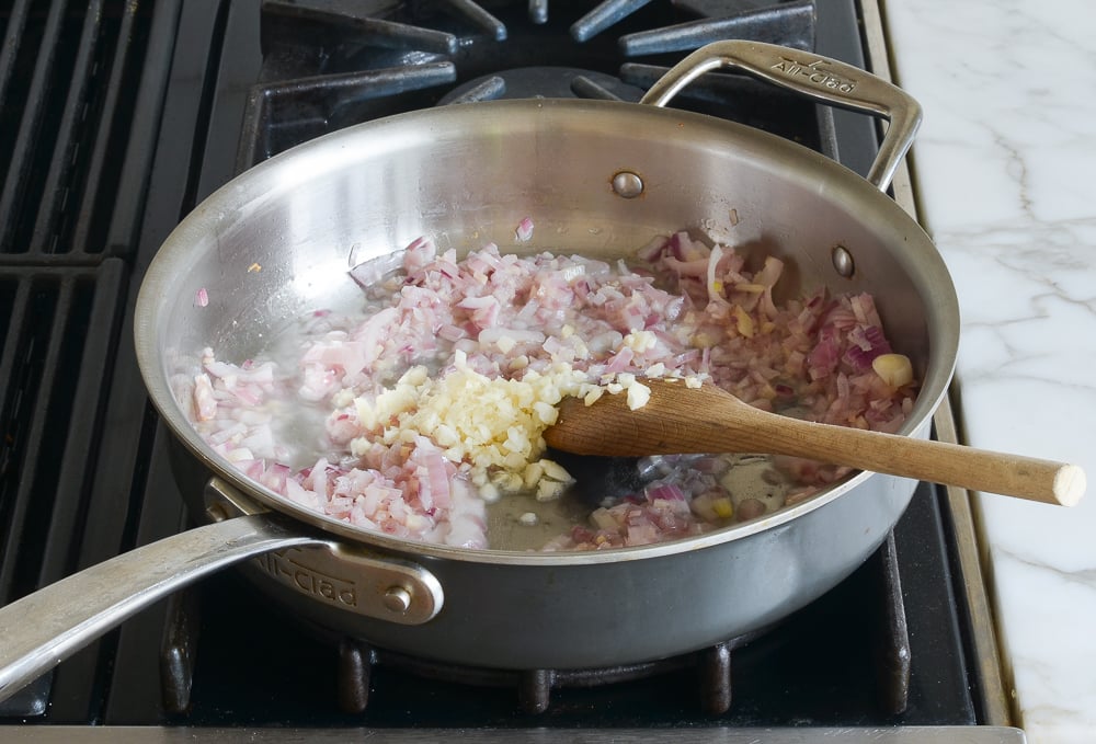 adding the garlic