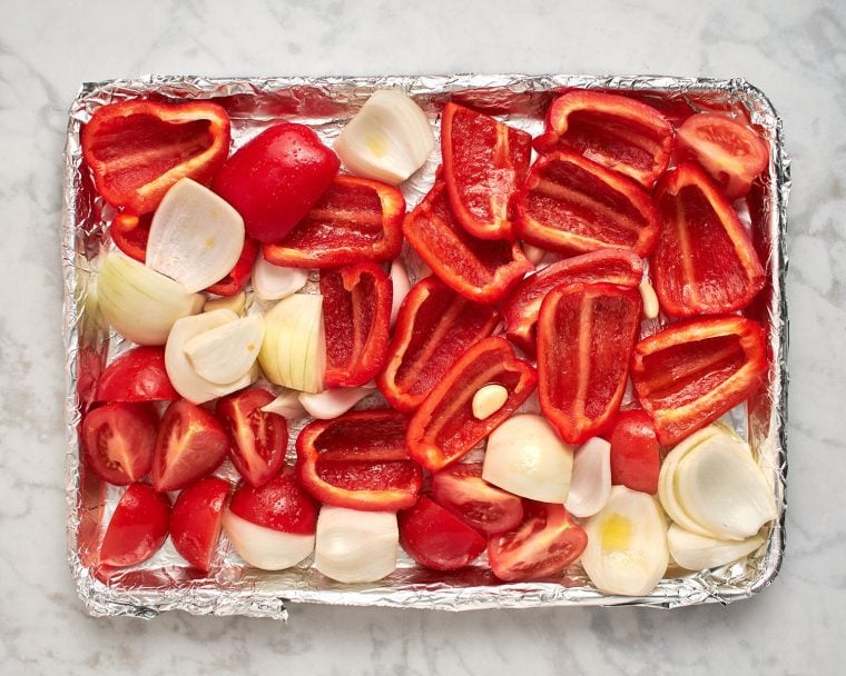 raw veggies on baking shet