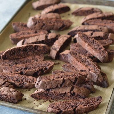Double Chocolate Biscotti on a lined baking sheet.
