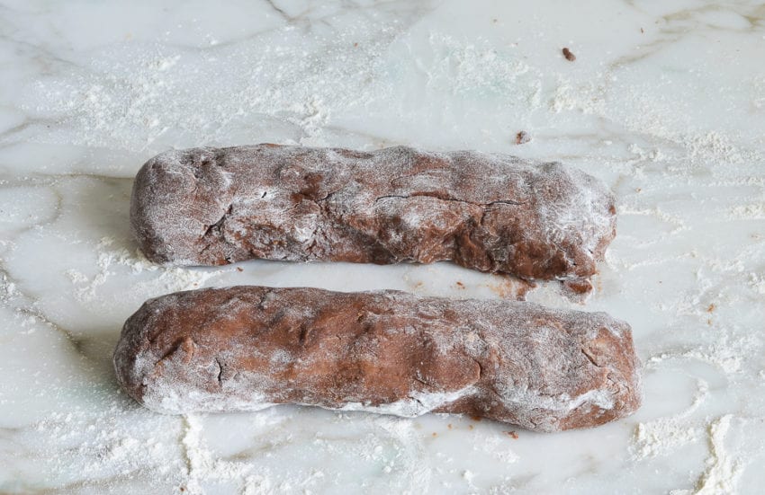 Two logs of chocolate biscotti dough.