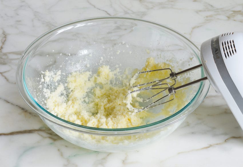 Creamed butter and sugar in a bowl.