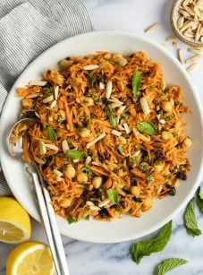 moroccan-spiced carrot and chickpea salad in white bowl.