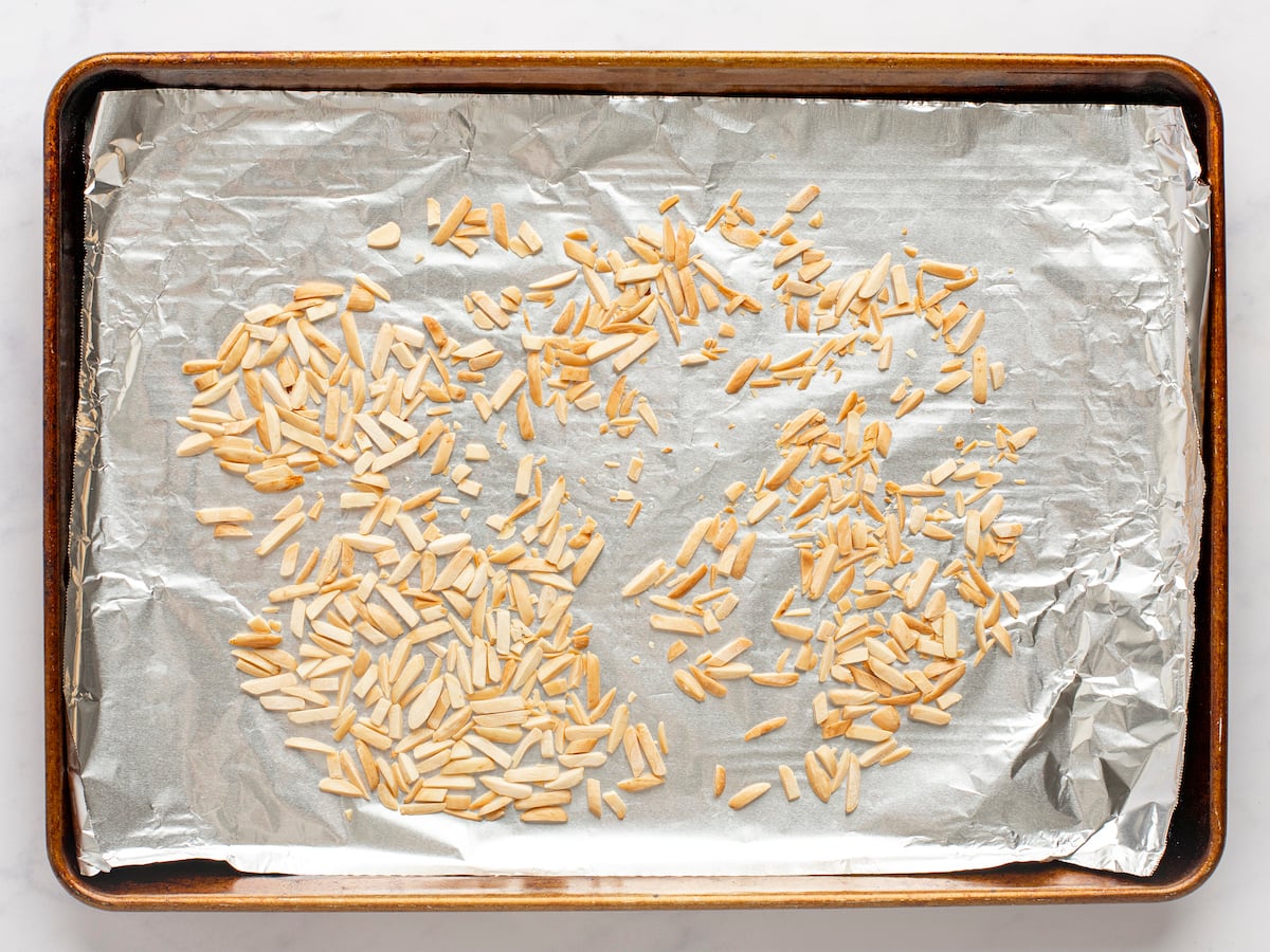 toasted almonds on baking sheet.