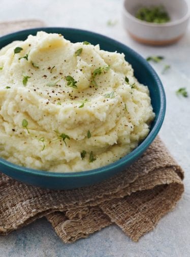 Blue bowl of cauliflower puree.
