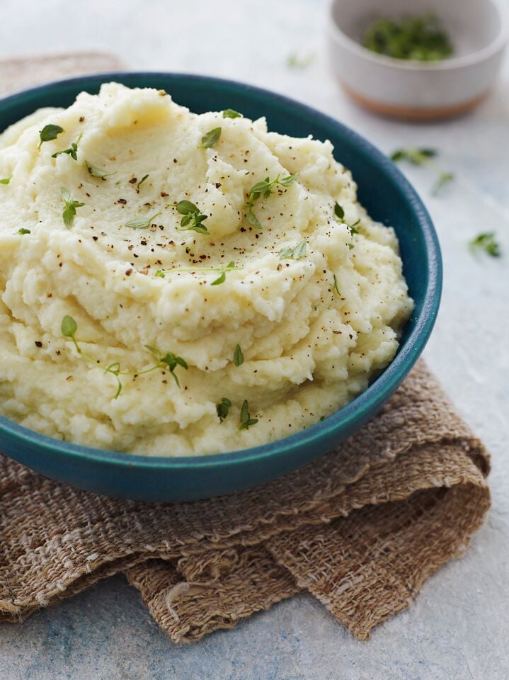 Blue bowl of cauliflower puree.